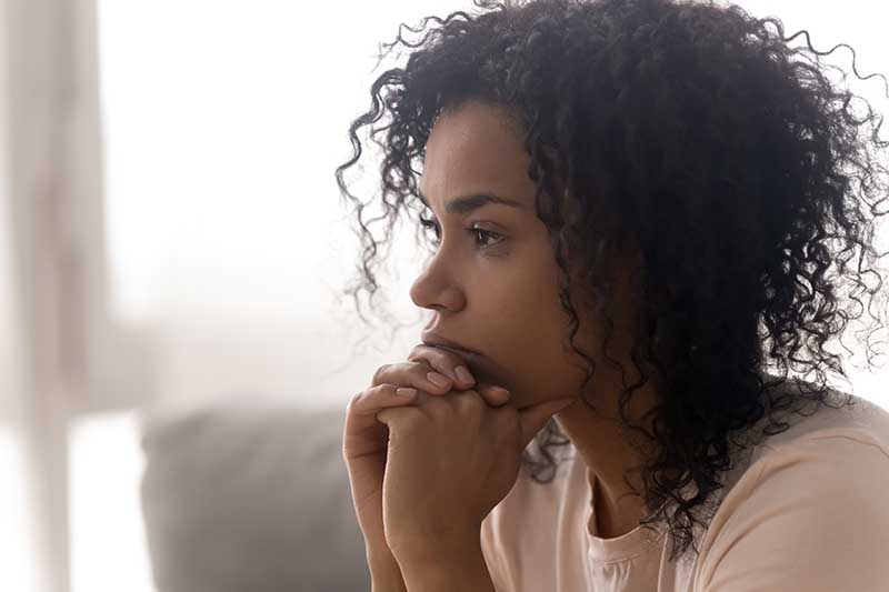 a woman considers attending an anxiety treatment centr at viewpoint dual recovery center