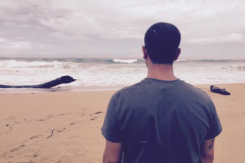 a man thinks about ptsd treatment at an arizona dual diagnosis treatment center