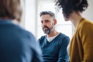 a man studies a people at an arizona substance abuse treatment center and thinks about arizona substance abuse treatment programs