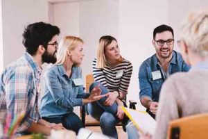 a group of people participate in a group therapy program in arizona