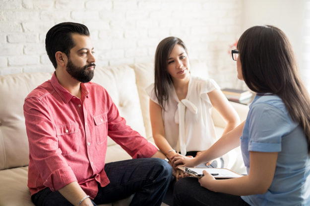 a therapist assists in treating a dual diagnosis in drug rehab