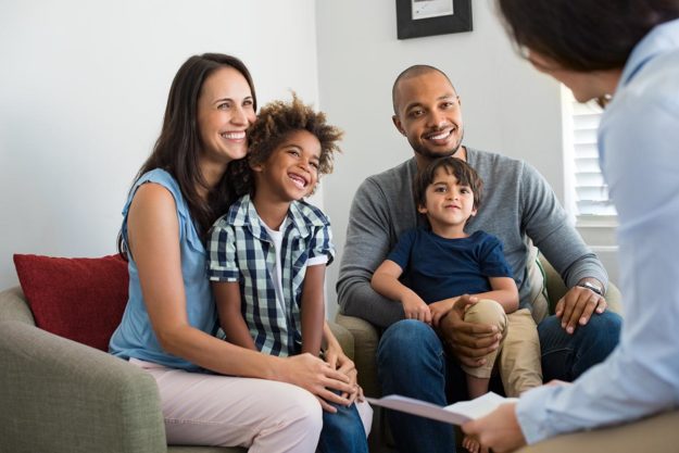 a family learning about the benefits of family therapy