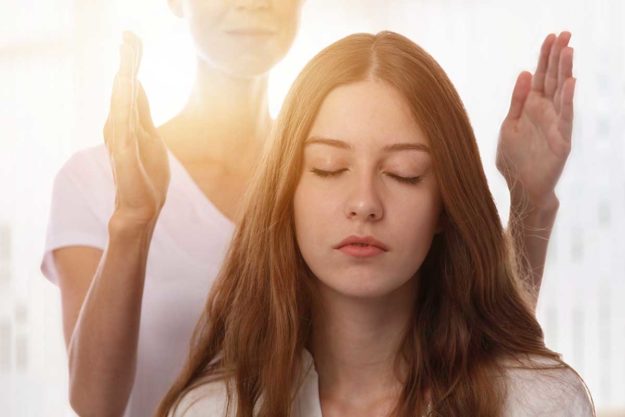 a woman undergoing holistic therapy