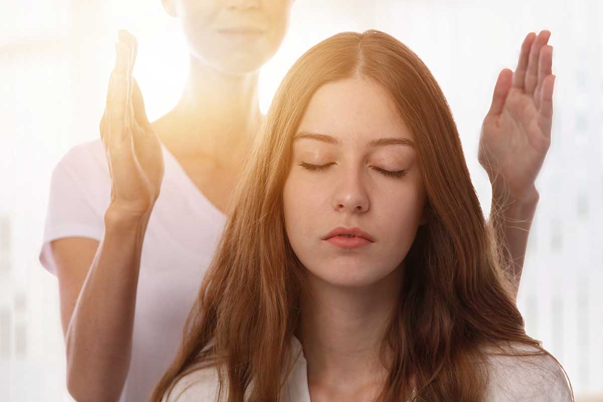 a woman undergoing holistic therapy